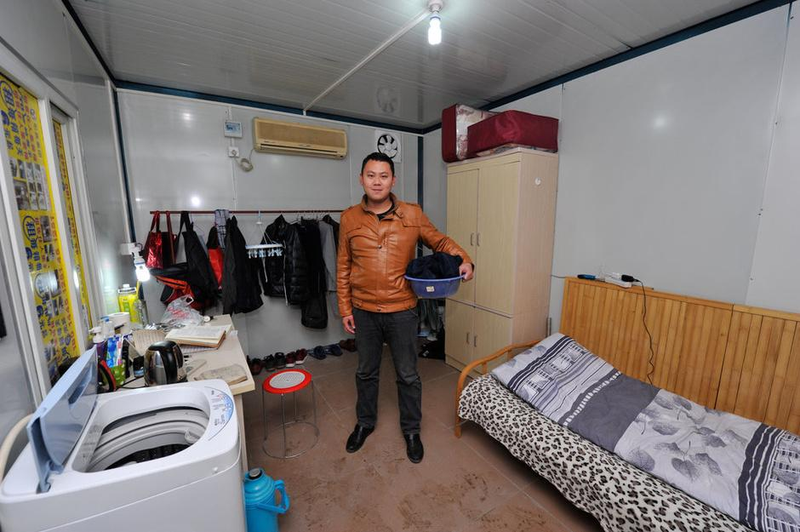 Illustration for article titled China's "Cabinet Tribe" Lives in Shipping Containers
